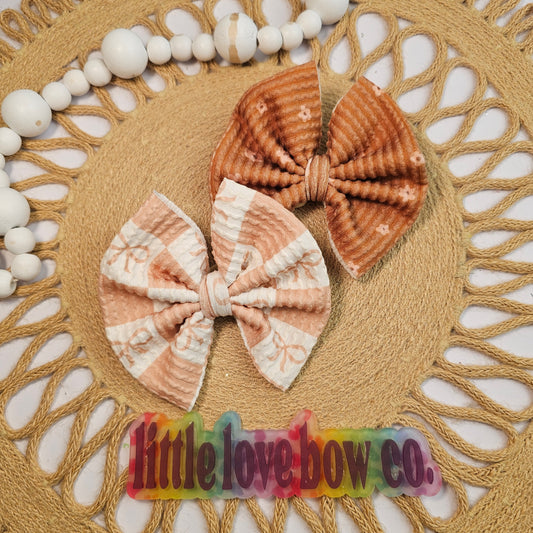 Wavy checked bows